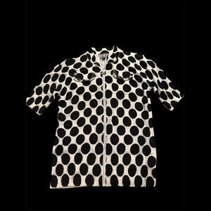 The collective works of Berer rhinestone zip polka dot blouse